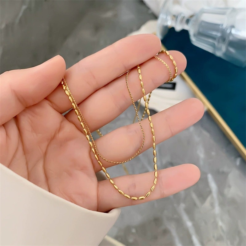 European and American fashion ins simple niche design rice grain chain personality stainless steel plated 18K gold multi-layer necklace women's wholesale