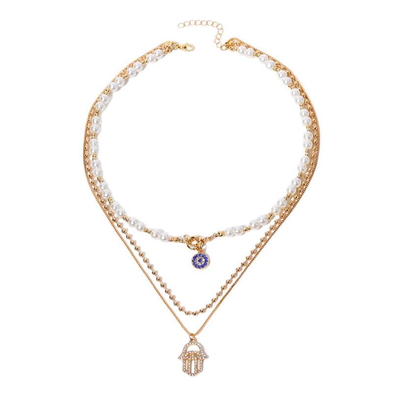 Cross border hot selling 2025 new European and American exaggerated diamond inlaid multi-layer necklace women's pearl eye pendant chain set