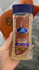 Dr. Davey Replenishing Glow Body Gel Oil with 100% pure cocoa butter - This body oil is formulated to moisturize dry skin, leaving it soft and smooth without a greasy residue.