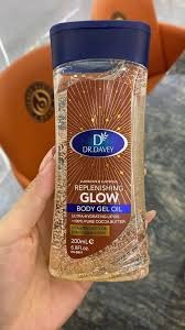 Dr. Davey Replenishing Glow Body Gel Oil with 100% pure cocoa butter - This body oil is formulated to moisturize dry skin, leaving it soft and smooth without a greasy residue.