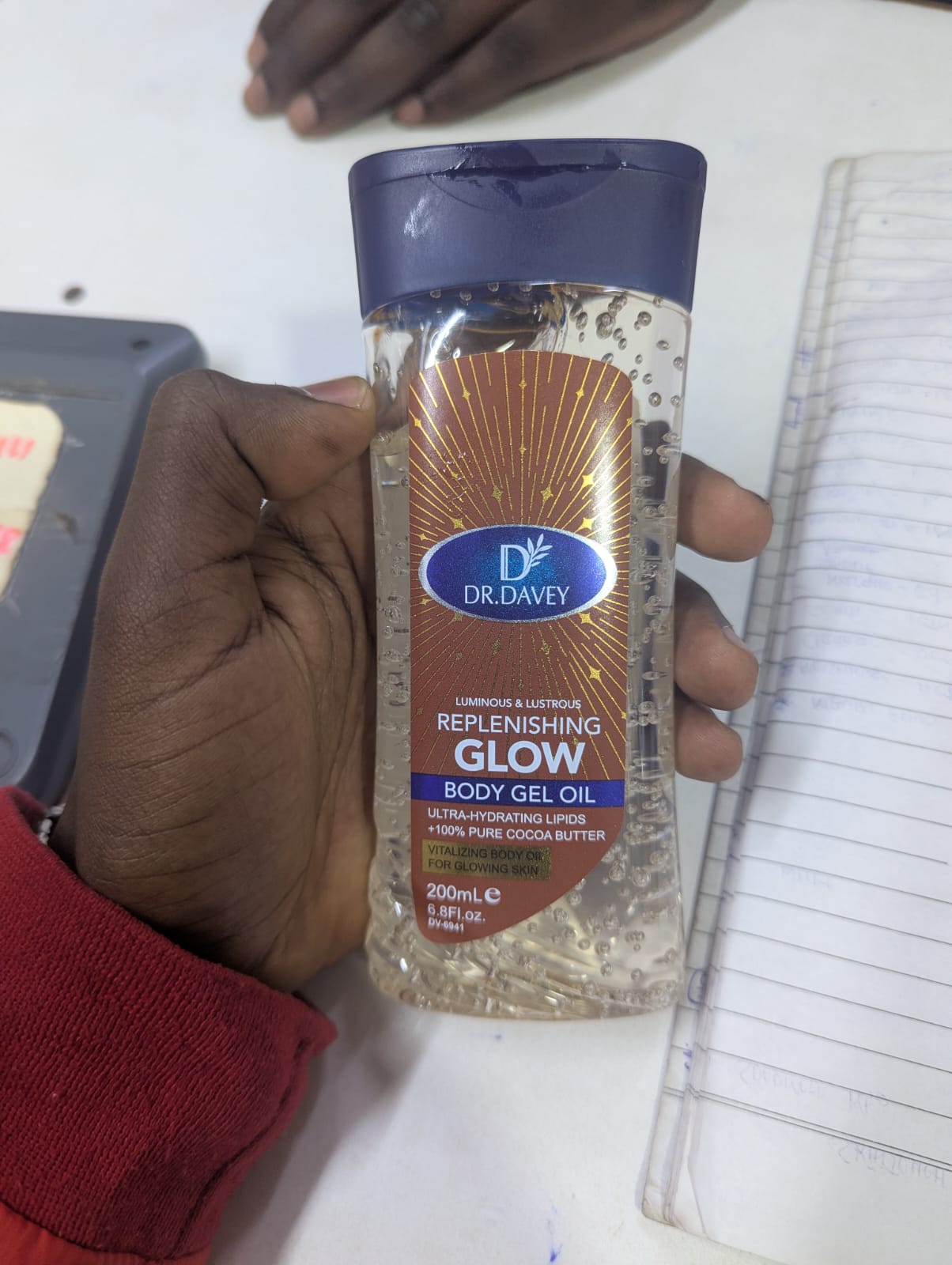 Dr. Davey Replenishing Glow Body Gel Oil with 100% pure cocoa butter - This body oil is formulated to moisturize dry skin, leaving it soft and smooth without a greasy residue.