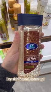 Dr. Davey Replenishing Glow Body Gel Oil with 100% pure cocoa butter - This body oil is formulated to moisturize dry skin, leaving it soft and smooth without a greasy residue.