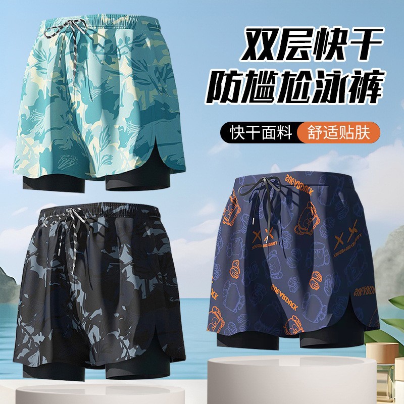 Adult Men's Swimming Trunks 2026 🏊 Men’s Double-Layer Swimming Trunks 🌊Step into summer with a stylish and youthful look 😎. These men’s swimming trunks feature a sleek black design.