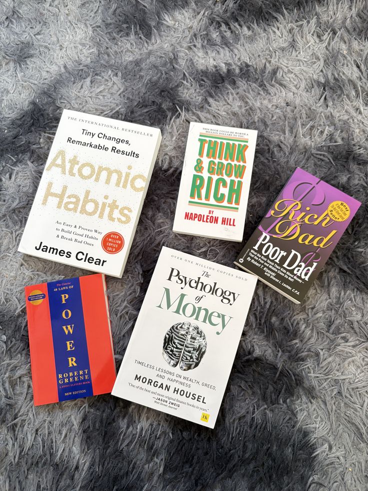 1. Atomic Habits by James Clear 2. Think and Grow Rich by Napoleon Hill 3. Rich Dad Poor Dad by Robert T. Kiyosaki 4. The Psychology of Money by Morgan Housel 5. The 48 Laws of Power by Robert Greene