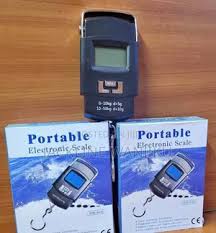 50Kgs electronic portable scale weighing machine with lcd digital display + Batteries Digital Luggage Scale Professional Suitcase Travel Bag Hanging Scales Weight Balance with Tape Measure Backlight