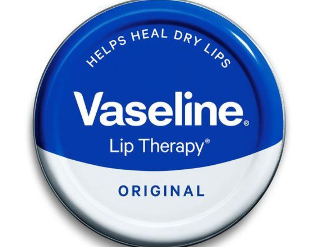 Vaseline Cocoa Butter Lip Therapy Moisturizing Lip Balm for Dry Cracked Lips with Cocoa Butter & Petroleum Jelly Long Lasting Hydration Glossy Smooth Lip Care Pocket Size for Men Women