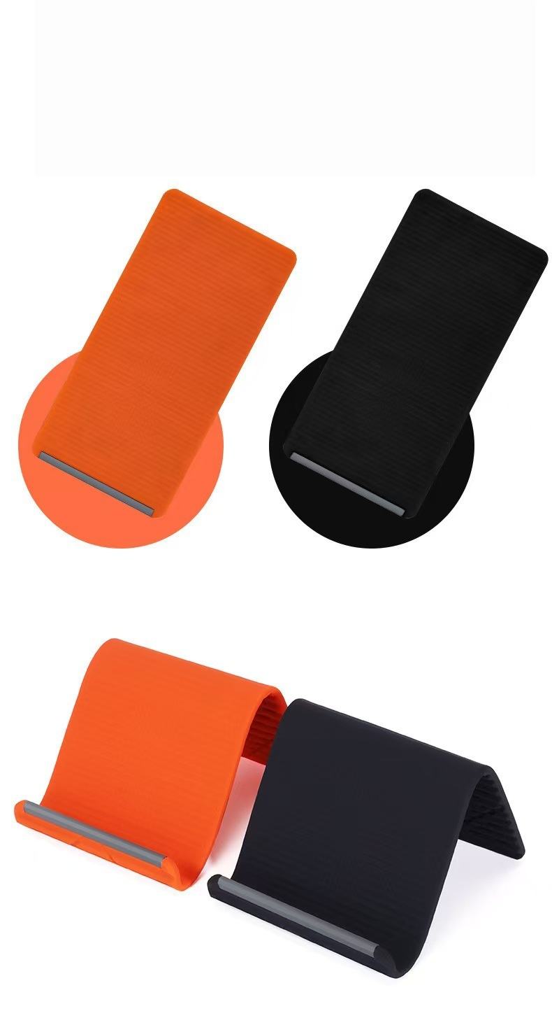 New Arrivals Multi-Functional Silicone Phone Stand, Adjustable Multi-Angle Holder, Non-Slip & Bendable for All Phones & Tablets Black/Orange