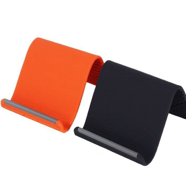 New Arrivals Multi-Functional Silicone Phone Stand, Adjustable Multi-Angle Holder, Non-Slip & Bendable for All Phones & Tablets Black/Orange