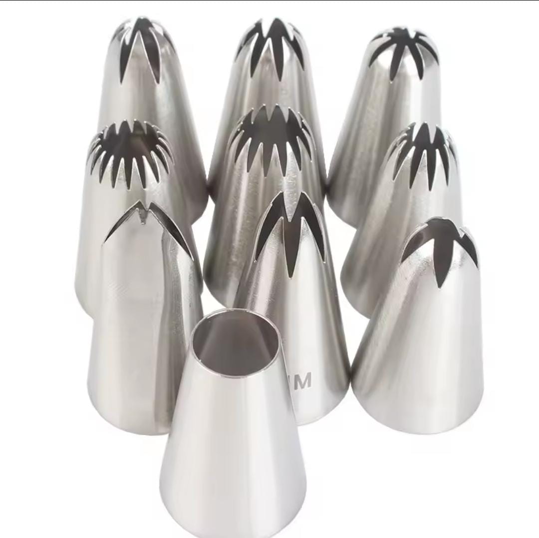 Cake icing noozles plus gun,Material: Stainless steel noozles with plastic gun, Colours: White, Pink and Purple