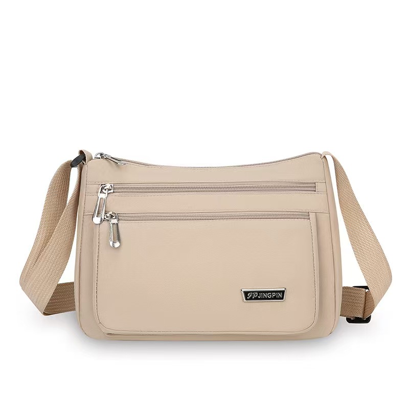 The New Versatile Crossbody Bag Is A Fashionable Multi-Compartment Single-Shoulder Bag For Work And Commuting It Is Water-Resistant And Lightweight For Middle-Aged Women