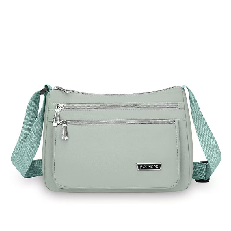 The New Versatile Crossbody Bag Is A Fashionable Multi-Compartment Single-Shoulder Bag For Work And Commuting It Is Water-Resistant And Lightweight For Middle-Aged Women