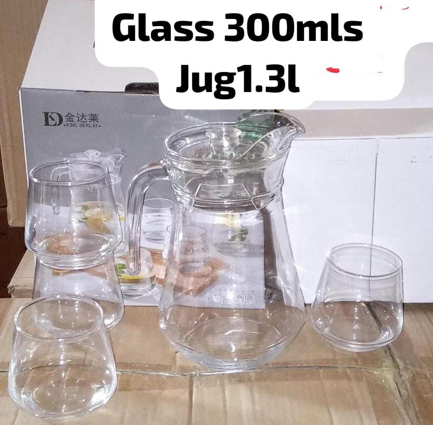 4PCS Glass Set with Matching Glass Jug. Perfect for serving water, juice, cocktail lemonade iced tea and other refreshing drinks this set combains beauty and everyday convinience