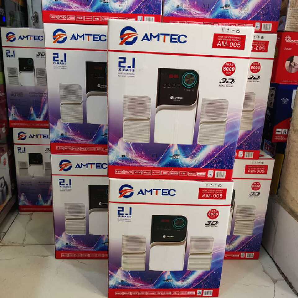 the Amtec AM-005 2.1 Channel Multimedia Speaker System, designed to deliver enjoyable sound and enhanced bass for music, movies, and everyday entertainment. Featuring a subwoofer and two satellite .