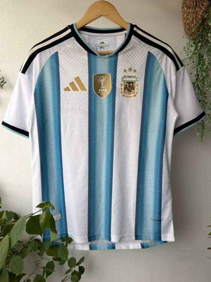 World cup Argentina Home Jersey (Player Version)– Sky Blue & White Stripes, Gold Accents | Sizes S - 2XL.  CHAMPIONS KIT.