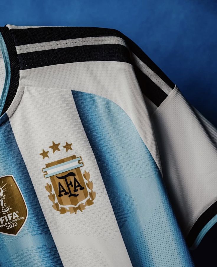 World cup Argentina Home Jersey (Player Version)– Sky Blue & White Stripes, Gold Accents | Sizes S - 2XL.  CHAMPIONS KIT.