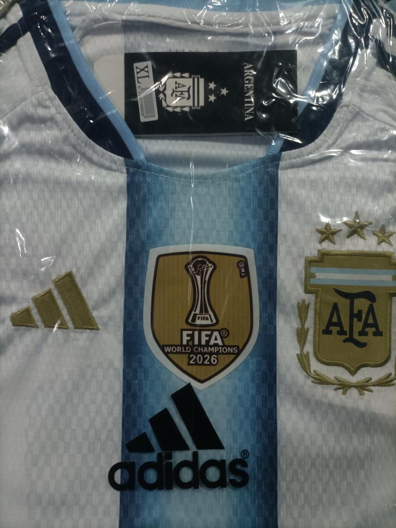 World cup Argentina Home Jersey (Player Version)– Sky Blue & White Stripes, Gold Accents | Sizes S - 2XL.  CHAMPIONS KIT.