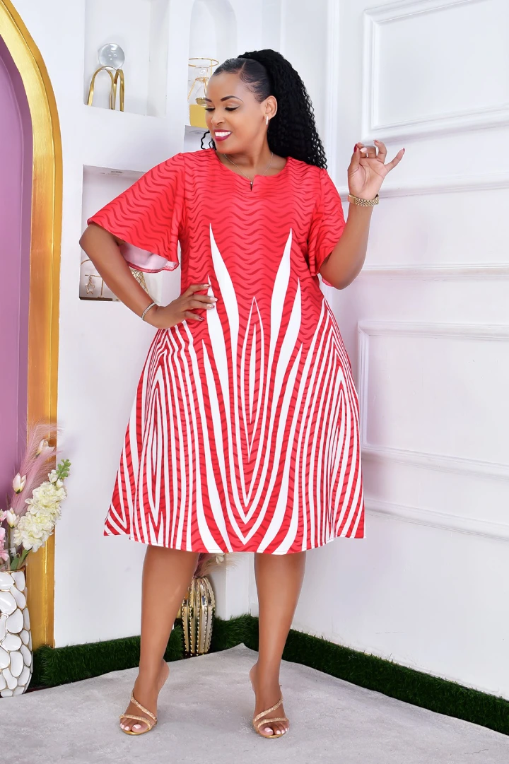 Women's Ruby Blossom Free African Print Skater Dress Size M to 3XL — a stunning statement piece designed for sophisticated charm and effortless femininity.