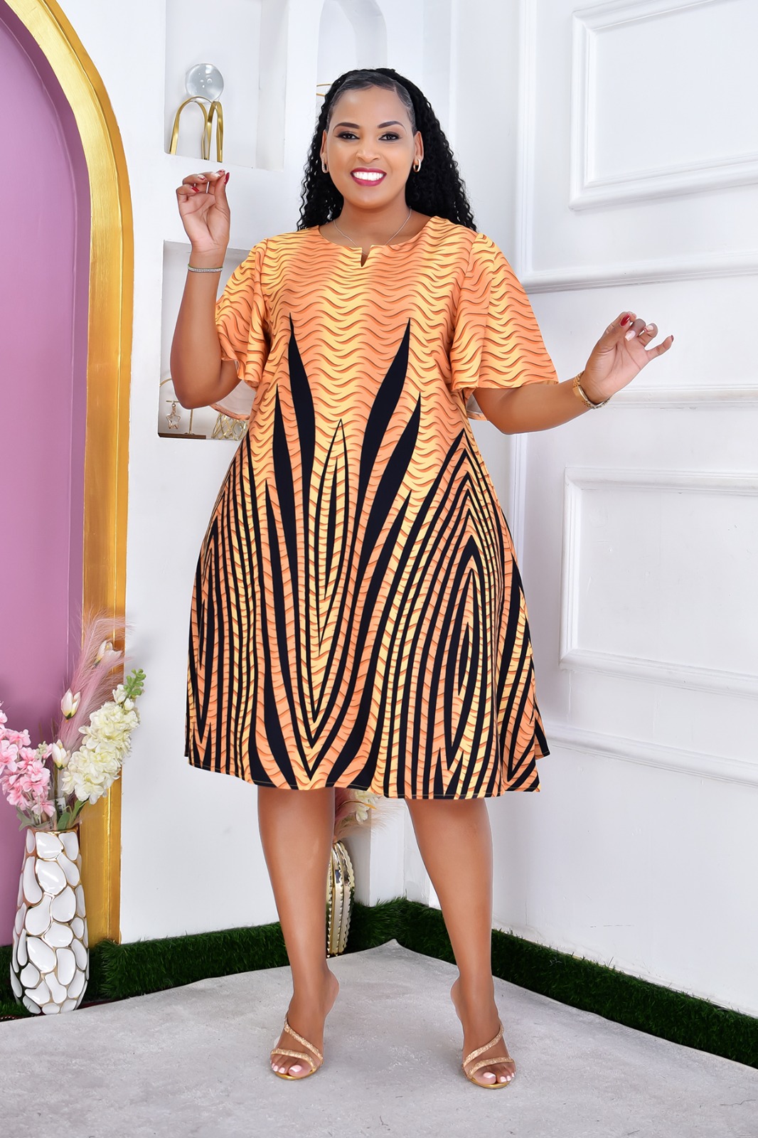 Women's Ruby Blossom Free African Print Skater Dress Size M to 3XL — a stunning statement piece designed for sophisticated charm and effortless femininity.