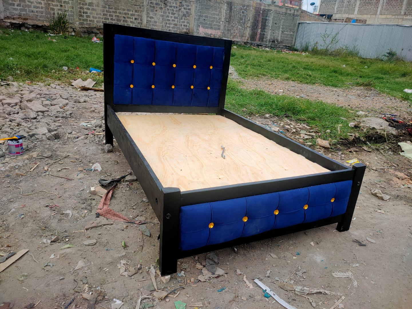 New classic bed 5 by 6 bed  Bed Frame High Quality Durable Beds Vertical Panel Design with Golden Accents.
The bed comes with a free gift (plywood) and a spanner for easy fixing