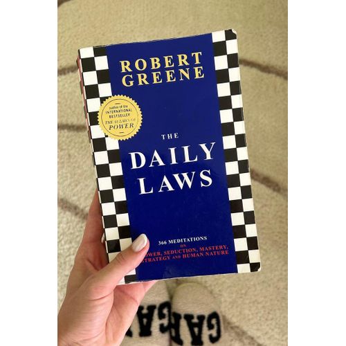 The Daily Laws: 366 Meditations on Power, Seduction, Mastery, Strategy, and Human Nature Book by Robert Greene