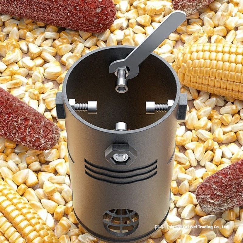 Handheld electric drill modified household small corn thresher for fast threshing of dry corn without damaging the grain. Farmer's labor-saving corn dehulling tool