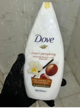Dove skin care set/Dove 4-in-1 Pampering Shea Butter & Vanilla skincare set, which includes a body wash, body lotion, beauty bar soap, and a Victoria's Secret Bare Vanilla fragrance mist.