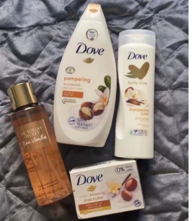 Dove skin care set/Dove 4-in-1 Pampering Shea Butter & Vanilla skincare set, which includes a body wash, body lotion, beauty bar soap, and a Victoria's Secret Bare Vanilla fragrance mist.