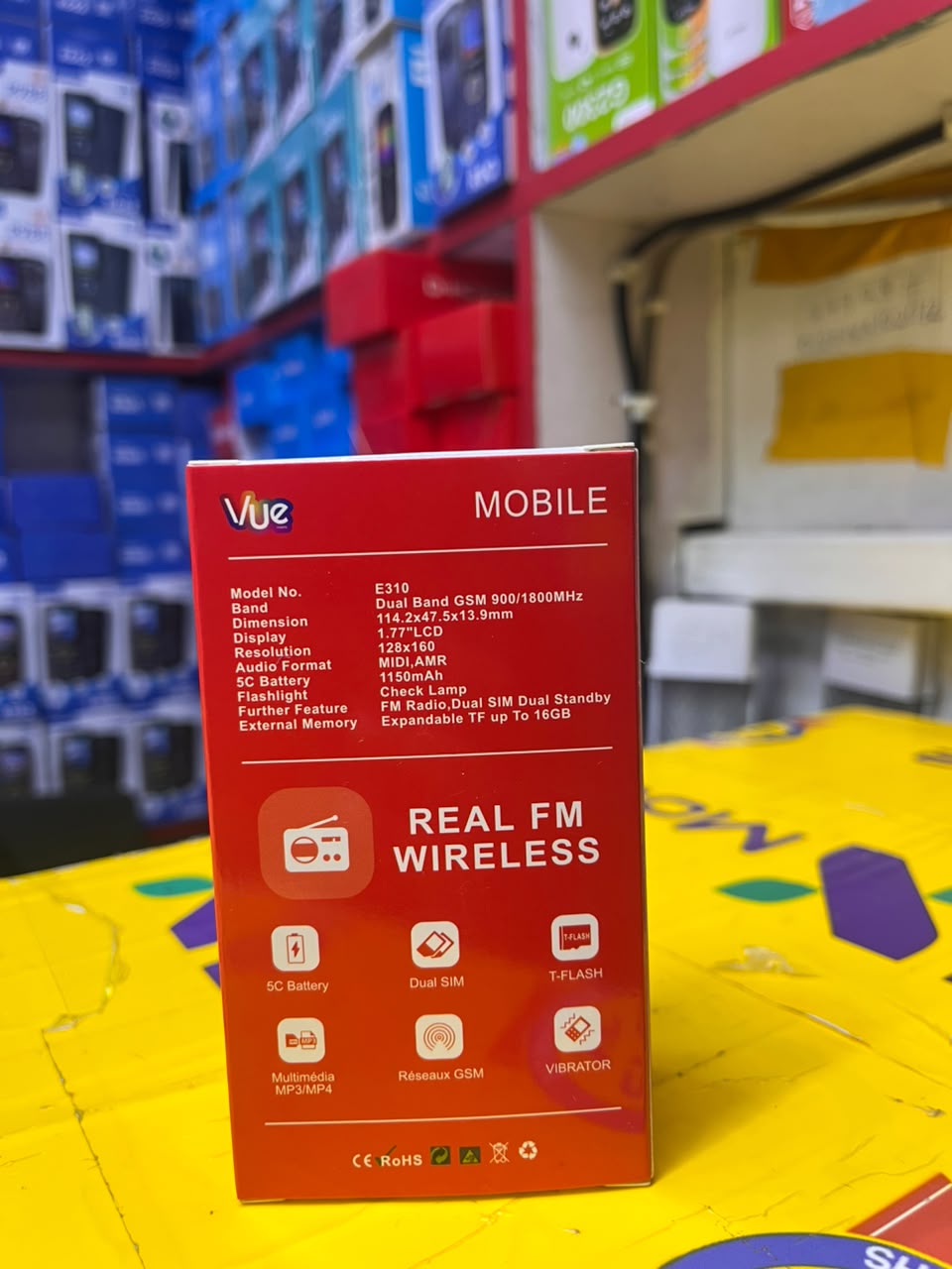 VUE E310 IS AN AFFORDABLE DUAL-SIM FEATURE PHONE FEATURING A 1.77-INCH SCREEN, A WIRELESS FM RADIO, AND A BUILT-IN TORCH LIGHT (OFTEN STYLED LOCALLY AS A "MULIKA MWIZI" OR "KABAMBE" PHONE
