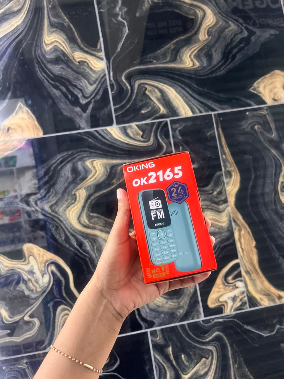 OKING OK 2165 FEATURED KABAMBE MOBILE PHONE WITH DUAL SIM CARD, LOUD SPEAKER, FACEBOOK, VIBRATION, ALARM, HD CAMERA, CALCULATOR, POWERFUL BATTERY, WIRELESS FM & BIG TORCH RELIABLE MOBILE PHONE DESIGN