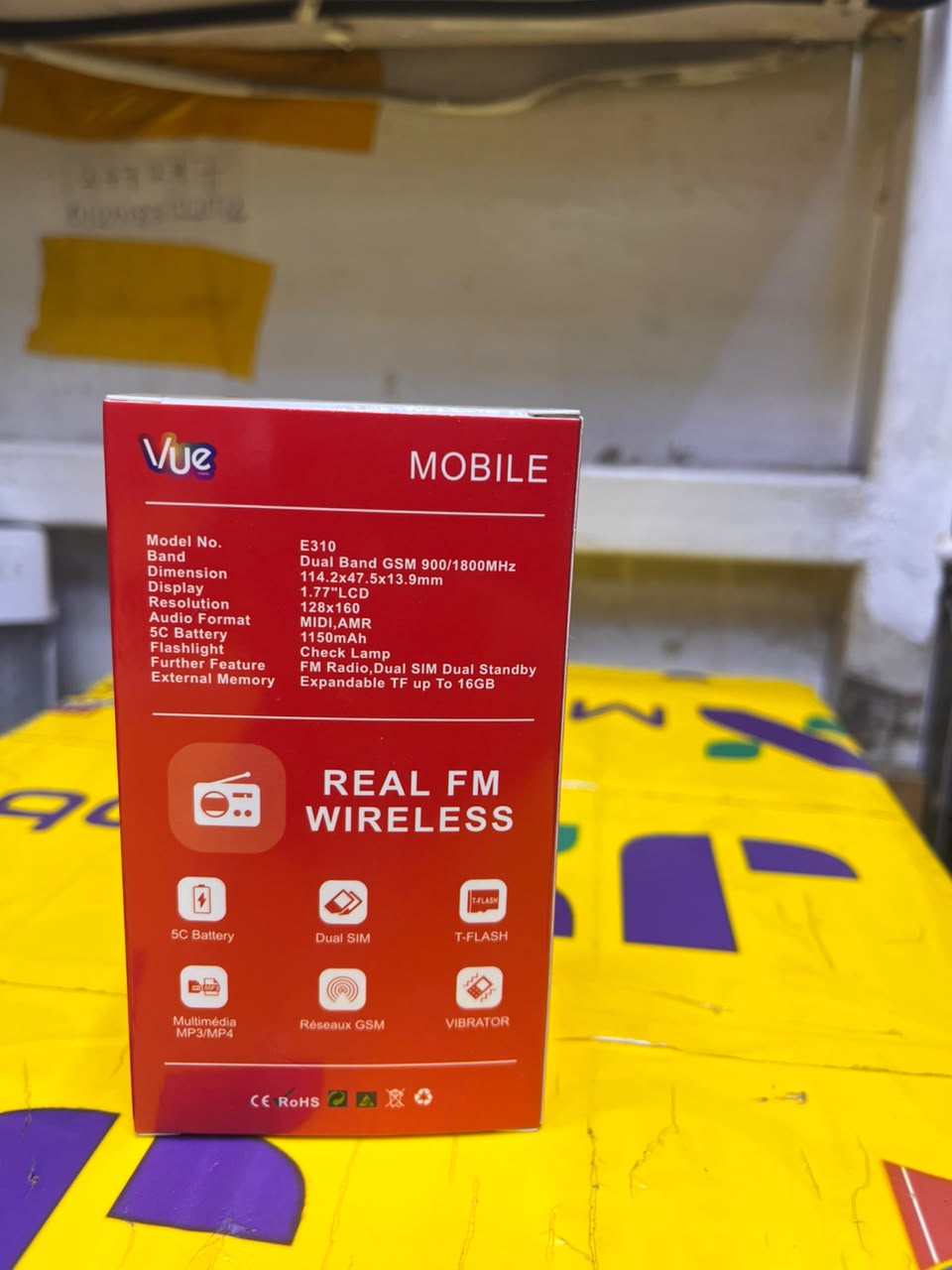 VUE E310 IS AN AFFORDABLE DUAL-SIM FEATURE PHONE FEATURING A 1.77-INCH SCREEN, A WIRELESS FM RADIO, AND A BUILT-IN TORCH LIGHT (OFTEN STYLED LOCALLY AS A "MULIKA MWIZI" OR "KABAMBE" PHONE