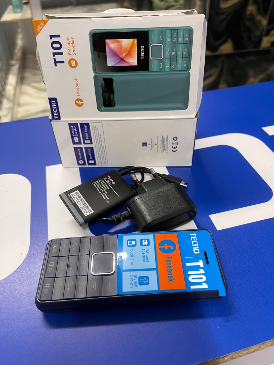 TECNO T101 FEATURE PHONE 32MB RAM 32MB ROM 1.77 INCH QVGA DISPLAY 0.08 MP REAR CAMERA 1000 MAH BATTERY DUAL SIM WIRELESS FM RADIO LOUD SPEAKER PHONES LED TORCH KATULULU KABAMBE SMARTPHONES WITH WATCH