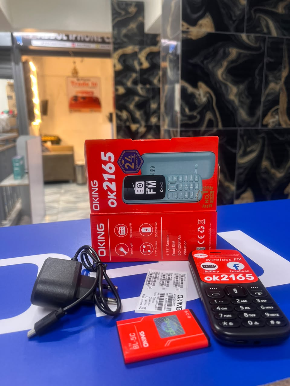 OKING OK 2165 FEATURED KABAMBE MOBILE PHONE WITH DUAL SIM CARD, LOUD SPEAKER, FACEBOOK, VIBRATION, ALARM, HD CAMERA, CALCULATOR, POWERFUL BATTERY, WIRELESS FM & BIG TORCH RELIABLE MOBILE PHONE DESIGN