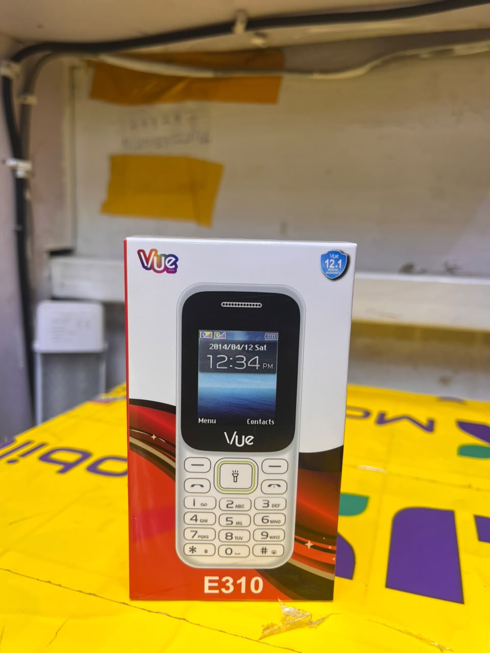 VUE E310 IS AN AFFORDABLE DUAL-SIM FEATURE PHONE FEATURING A 1.77-INCH SCREEN, A WIRELESS FM RADIO, AND A BUILT-IN TORCH LIGHT (OFTEN STYLED LOCALLY AS A "MULIKA MWIZI" OR "KABAMBE" PHONE