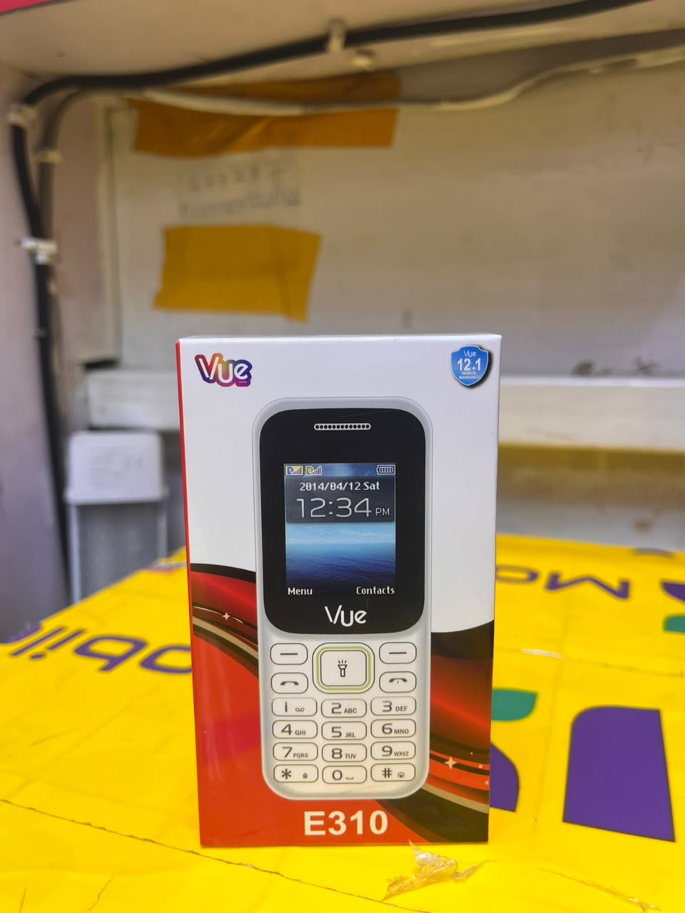 VUE E310 IS AN AFFORDABLE DUAL-SIM FEATURE PHONE FEATURING A 1.77-INCH SCREEN, A WIRELESS FM RADIO, AND A BUILT-IN TORCH LIGHT (OFTEN STYLED LOCALLY AS A "MULIKA MWIZI" OR "KABAMBE" PHONE