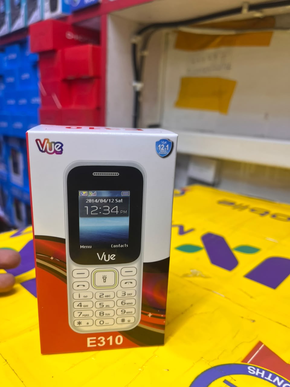 VUE E310 IS AN AFFORDABLE DUAL-SIM FEATURE PHONE FEATURING A 1.77-INCH SCREEN, A WIRELESS FM RADIO, AND A BUILT-IN TORCH LIGHT (OFTEN STYLED LOCALLY AS A "MULIKA MWIZI" OR "KABAMBE" PHONE