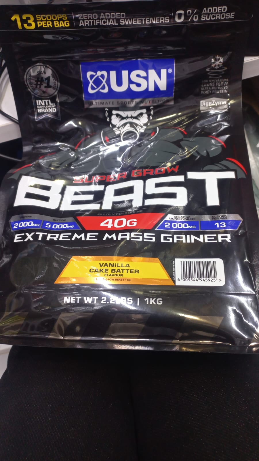 USN Super Grow Beast Extreme Mass Gainer, a high-calorie protein powder supplement designed for muscle building and weight gain 1KG