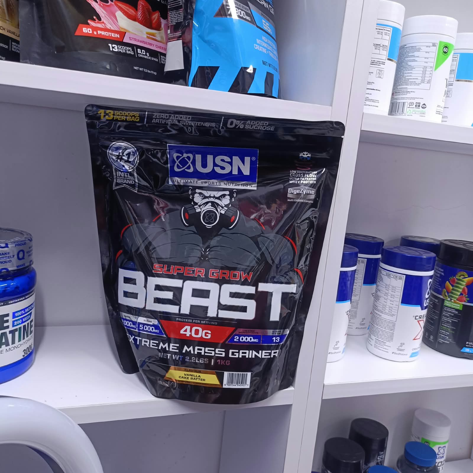 USN Super Grow Beast Extreme Mass Gainer, a high-calorie protein powder supplement designed for muscle building and weight gain 1KG