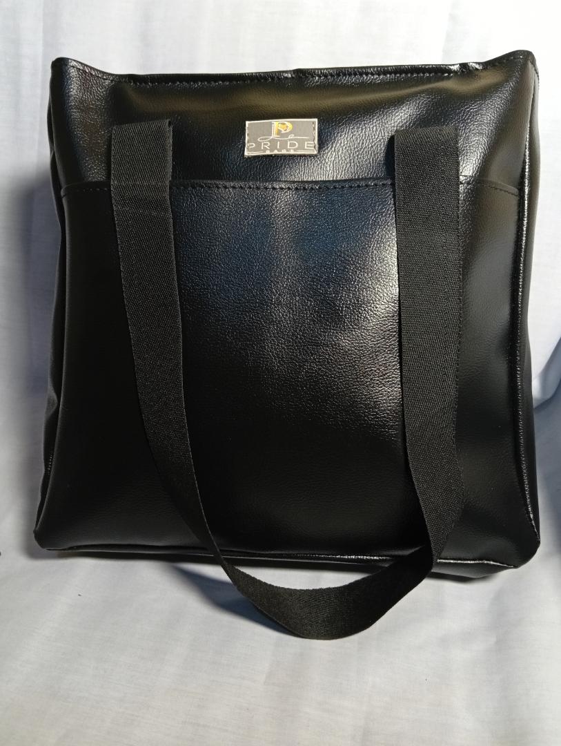 Ladies spacious waterproof totebag. can fit a laptop. strong handles with long lasting zipper and a cotton lining