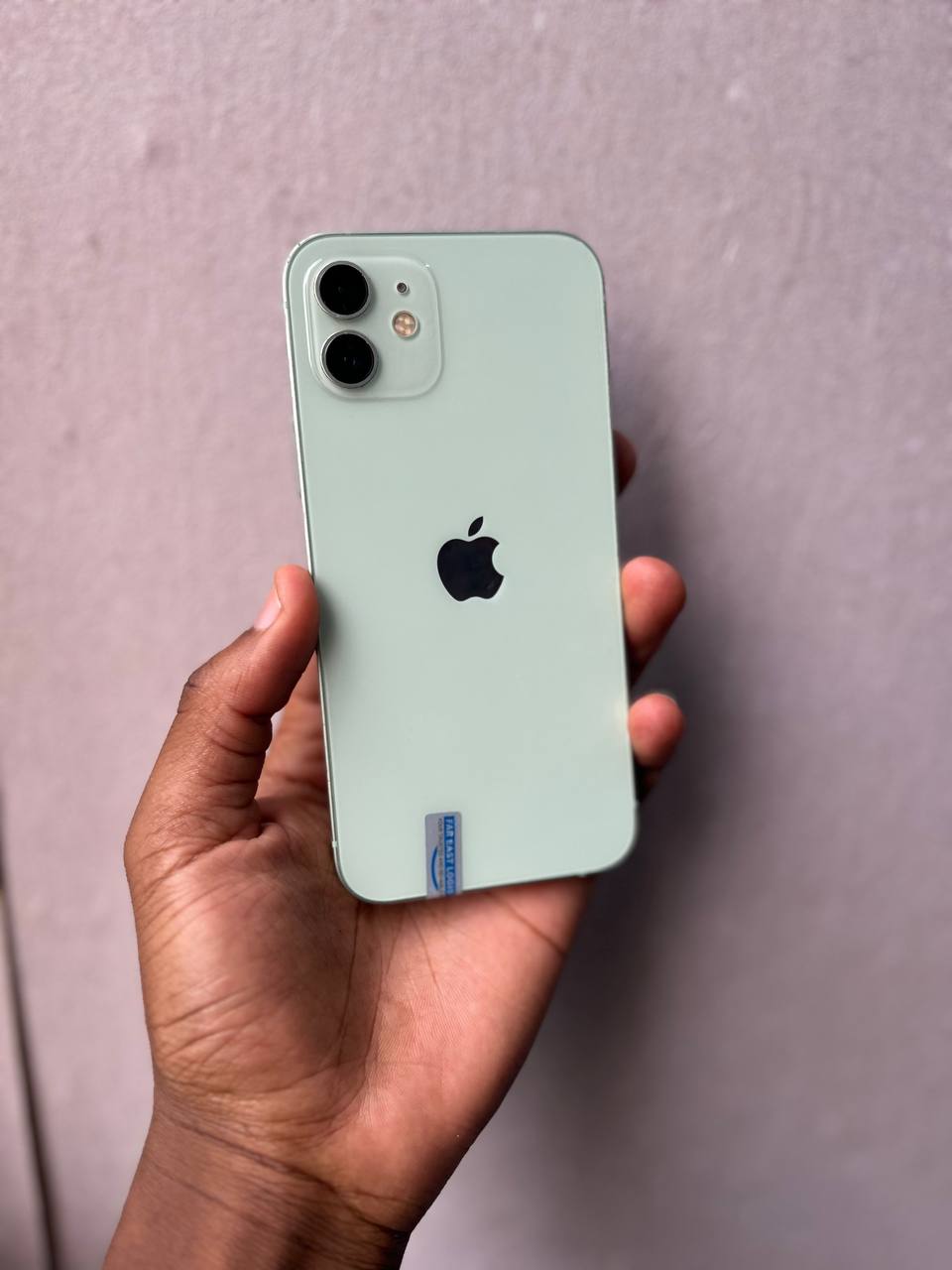 IPHONE 12 FEATURES A 6.1-INCH OLED DISPLAY, VISIBLE BLACKDOT ON SCREEN , A14 BIONIC CHIP, DUAL 12MP CAMERAS, 5G SUPPORT, AND A 94% BATTERY HEALTH FOR STRONG DAILY PERFORMANCE.