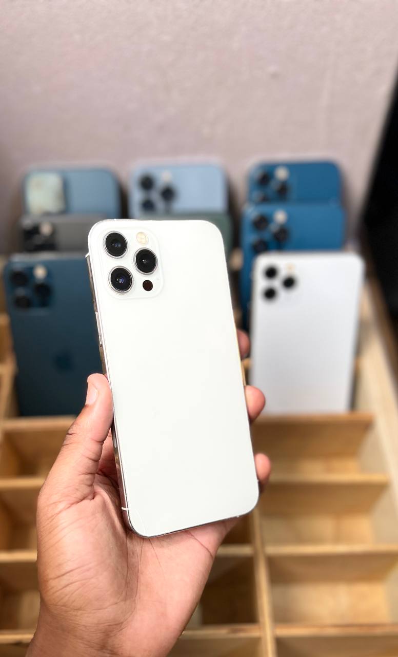 IPHONE 12 PRO MAX — ORIGINAL PARTS PROFESSIONALLY REPLACED, 90%+ BATTERY HEALTH, FACE ID FULLY FUNCTIONAL, EXTREMELY SMOOTH PERFORMANCE, CLEAN PREMIUM BODY, SHARP OLED DISPLAY, POWERFUL CAMERAS.