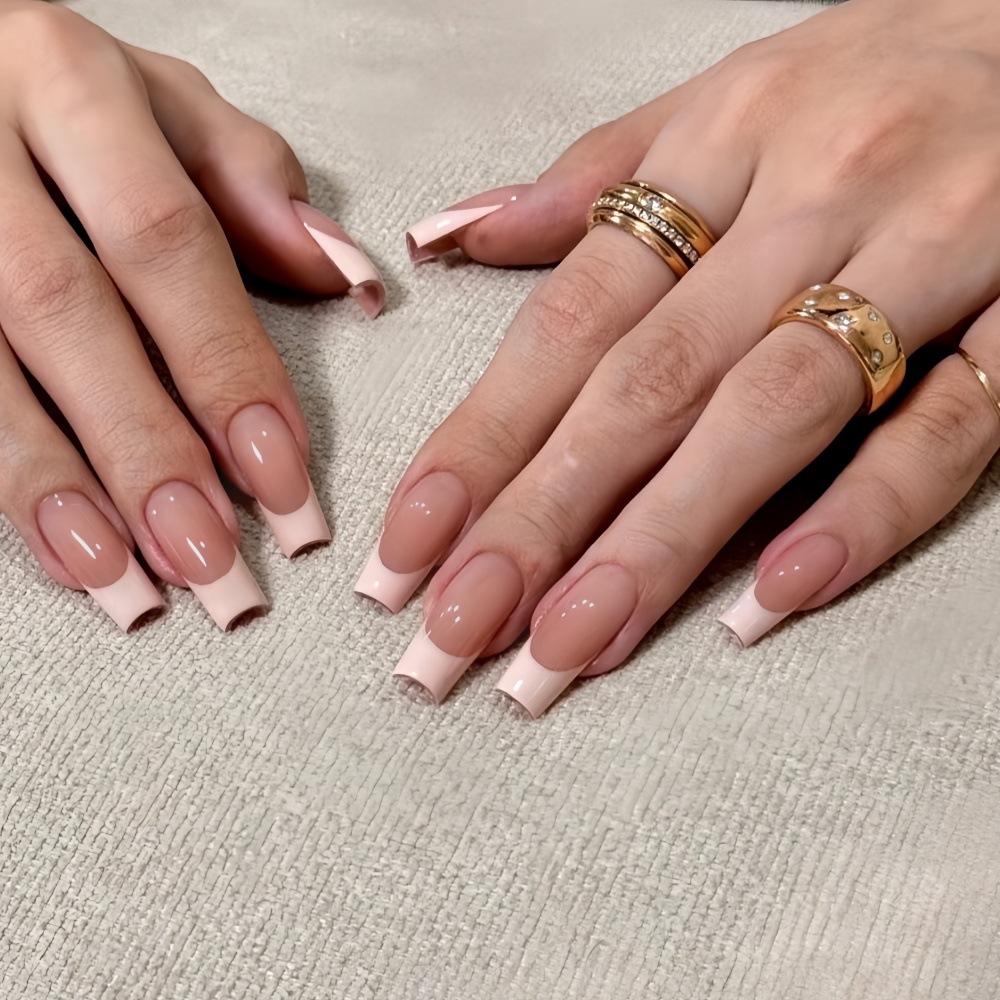 Wholesale nail tips from a factory specializing in foreign trade, featuring long, simple French nail tips with white edges for wearable nail art