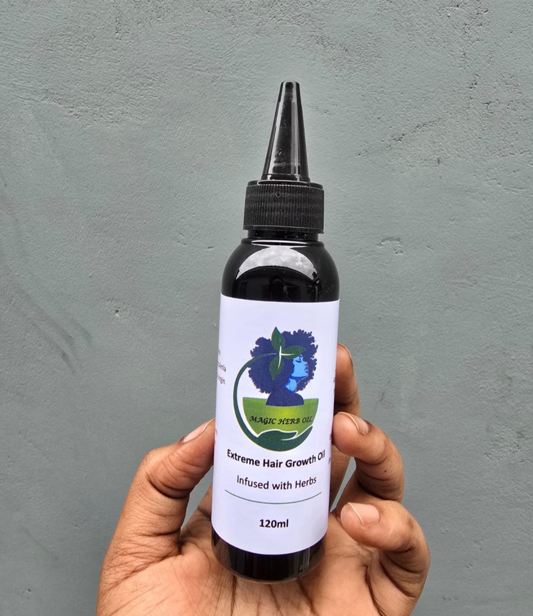 The Magic Herso Extreme Hair Growth Oil 120ml herbal product for stimulating hair growth.Reduce breakage and shedding by nourishing hair from the roots.