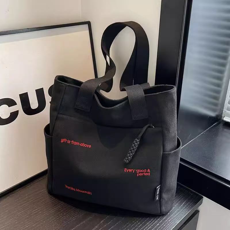 Canvas bag women's men's new trendy embroidery letter handbag student large capacity single shoulder tote bag office commuter crossbody bag