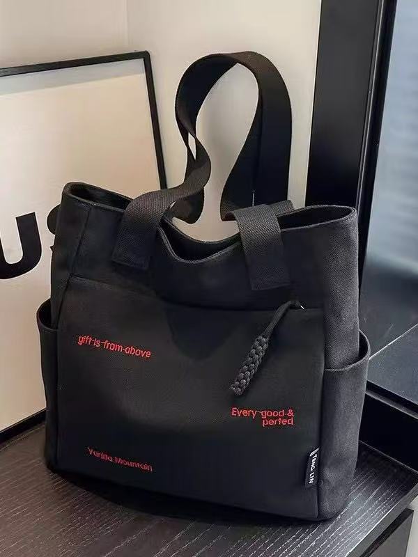 Canvas bag women's men's new trendy embroidery letter handbag student large capacity single shoulder tote bag office commuter crossbody bag
