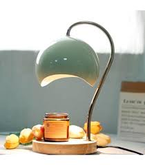 Nordic-style electric candle warmer lamp features a green hemispherical shade and a natural wood base
