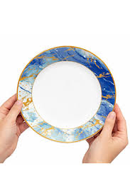 Signature "Majestic Ocean" 11-Inch Flatter Dinner Plate. Signature Majestic Ocean 11-inch Flatter Dinner Plate features a striking blue and gold marble rim pattern on durable opalware glass.