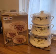 four-piece set of Signature Lorenzo insulated hot pots featuring stainless steel inner linings and floral rose designs,