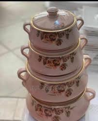 four-piece set of Signature Lorenzo insulated hot pots featuring stainless steel inner linings and floral rose designs,
