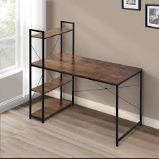 Computer desk features a rustic brown wood-grain finish paired with a black metal X-frame and an integrated multi-tier side bookshelf