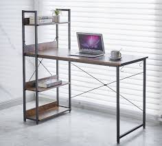 Computer desk features a rustic brown wood-grain finish paired with a black metal X-frame and an integrated multi-tier side bookshelf